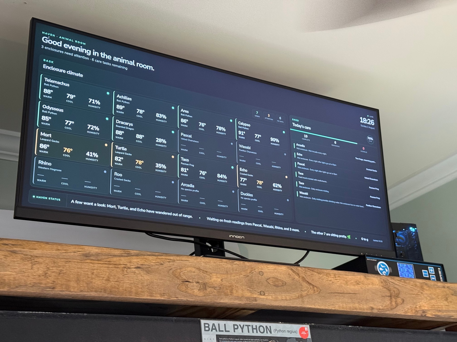 Haven running on a wide monitor above reptile enclosures